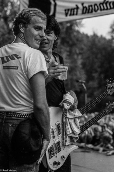 Rinus Gerritsen with bass roadie Willem Reitsma during Kampen show photo by Roel Vinkes August 20, 1983